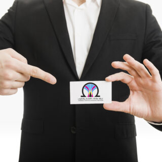businessman-pointing-business-card copy