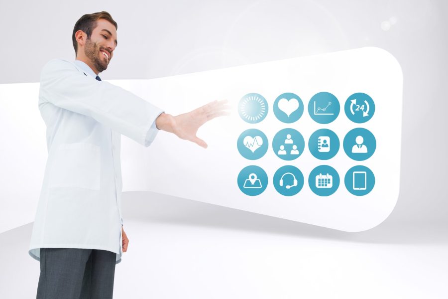 Doctor touching digitally generated medical icons against white background Digital composition of doctor touching digitally generated medical icons against white background